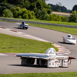 Solar cars on a track.